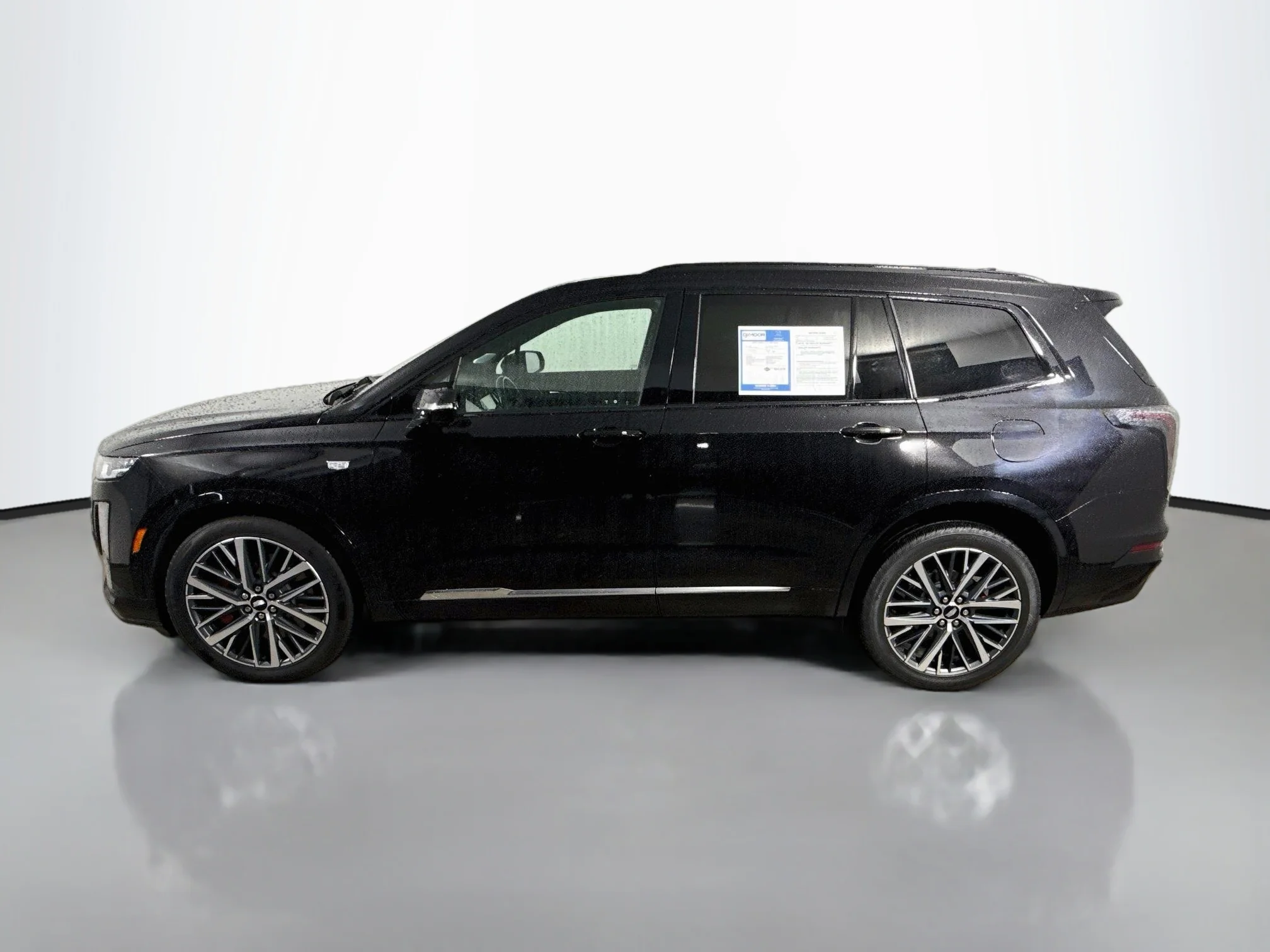 Used 2023 Stellar Black Metallic Cadillac AWD Sport image 4