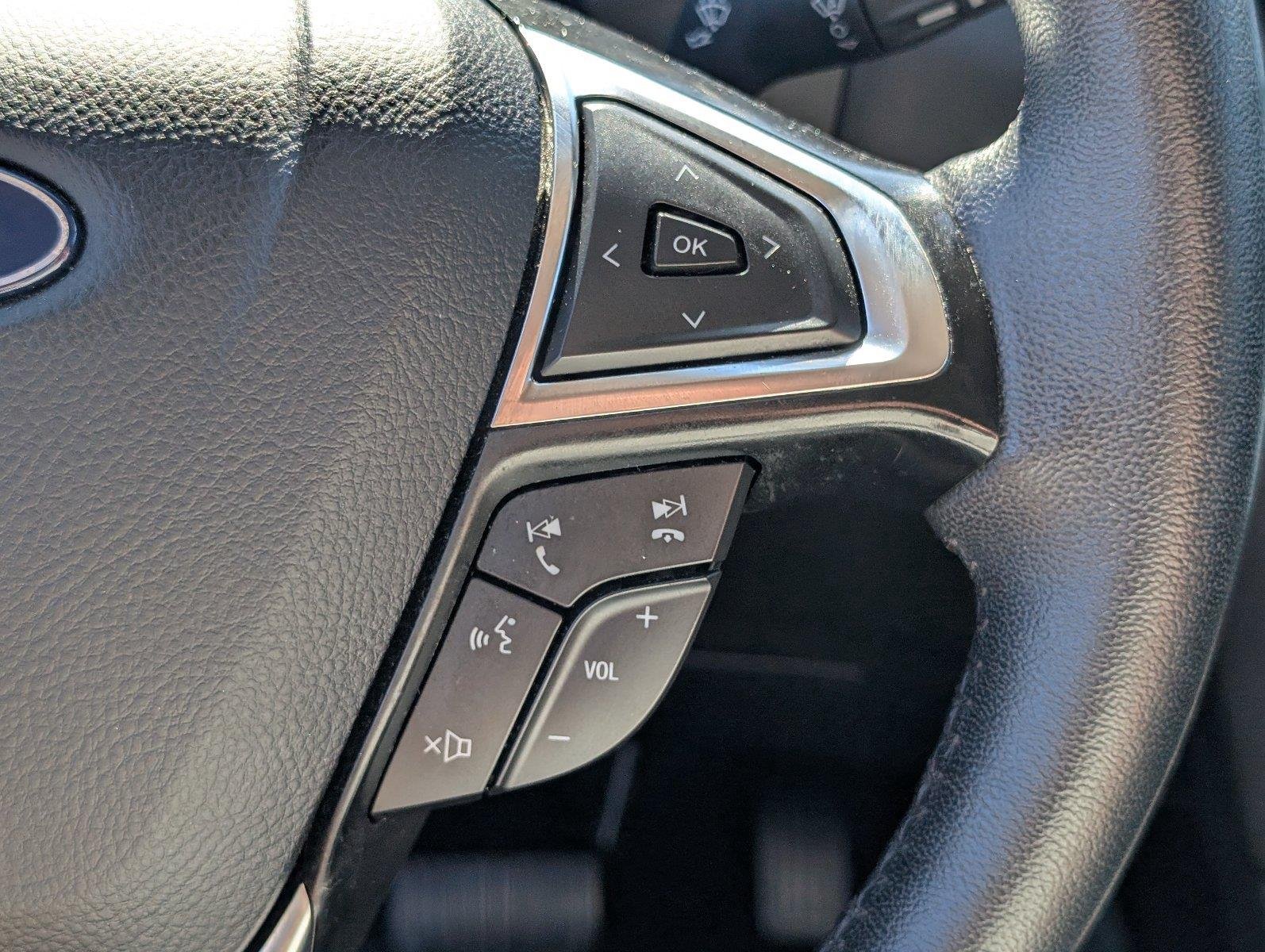 Used 2024 Stone Blue Ford Titanium image 29