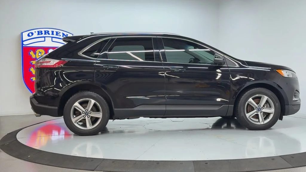 Used 2019 Agate Black Metallic Ford SEL image 4
