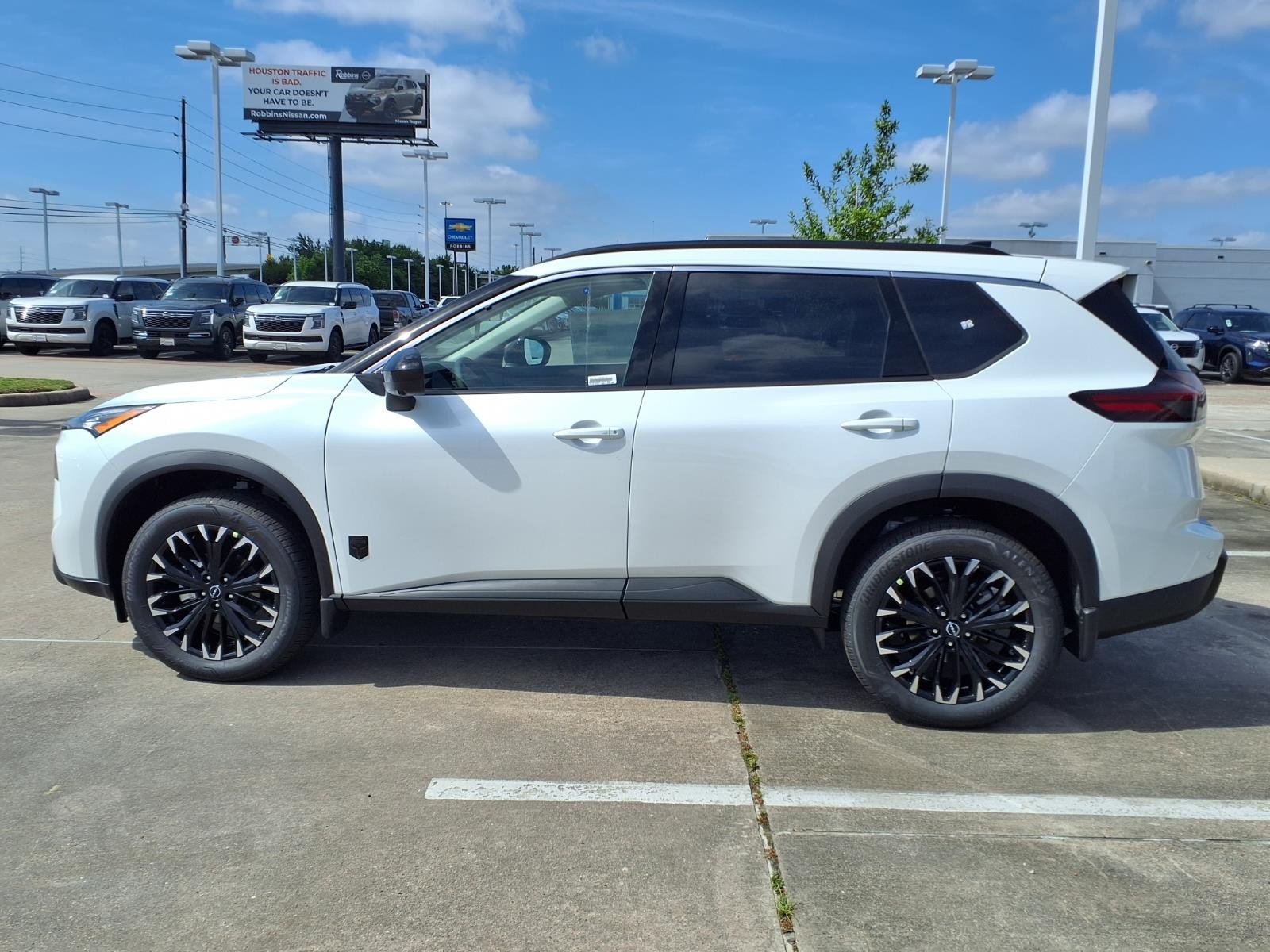 2026 Nissan Rogue Dark Armor™ White at Robbins Nissan