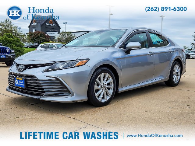 Used 2022 Celestial Silver Metallic Toyota LE image 1