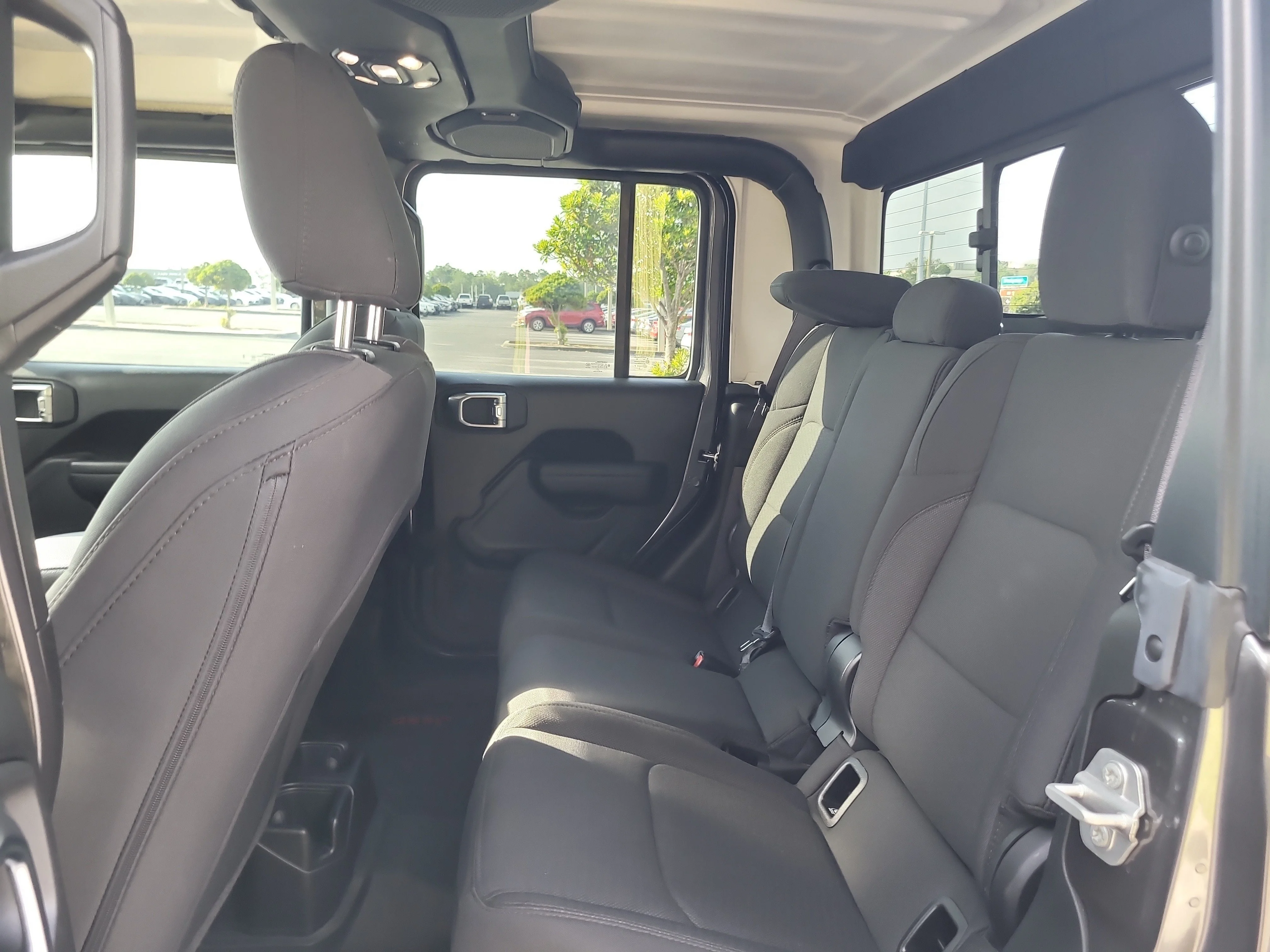 Used 2023 Granite Crystal Metallic Clearcoat Jeep Sport S image 13