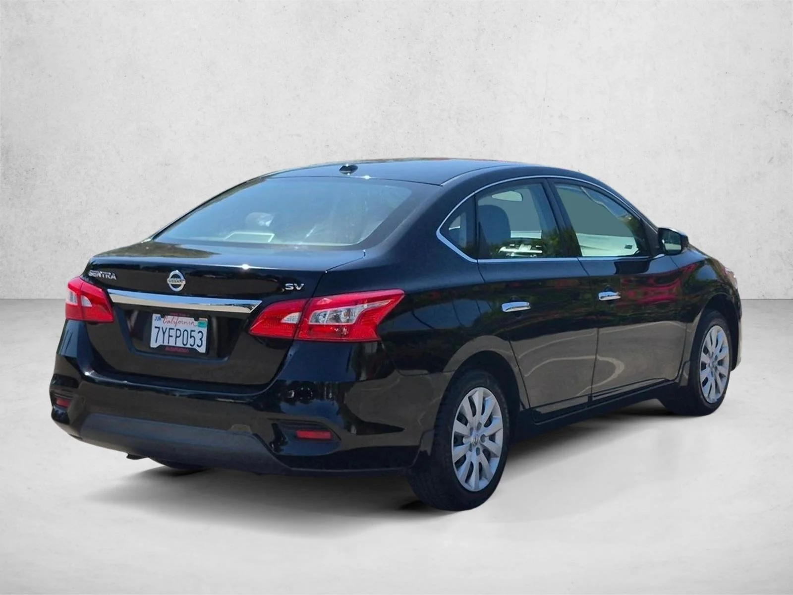 Used 2017 Super Black Nissan SV image 5