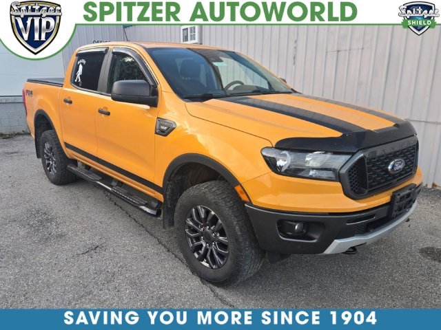 Used 2021 Orange Ford XLT image 1