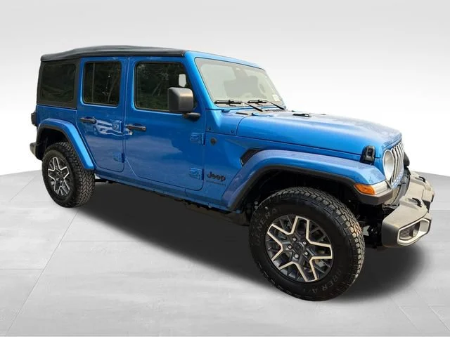 New 2026 Hydro Blue Pearl Coat Jeep Sahara image 1