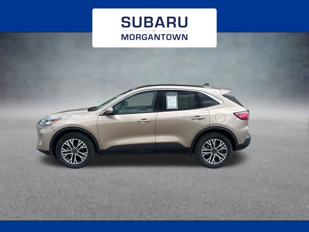 Used 2021 Gold Ford SEL image 1