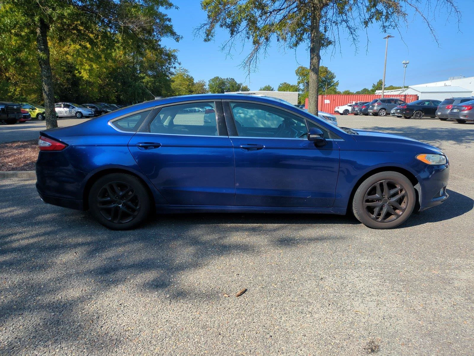 Used 2016 Deep Impact Blue Ford SE image 3