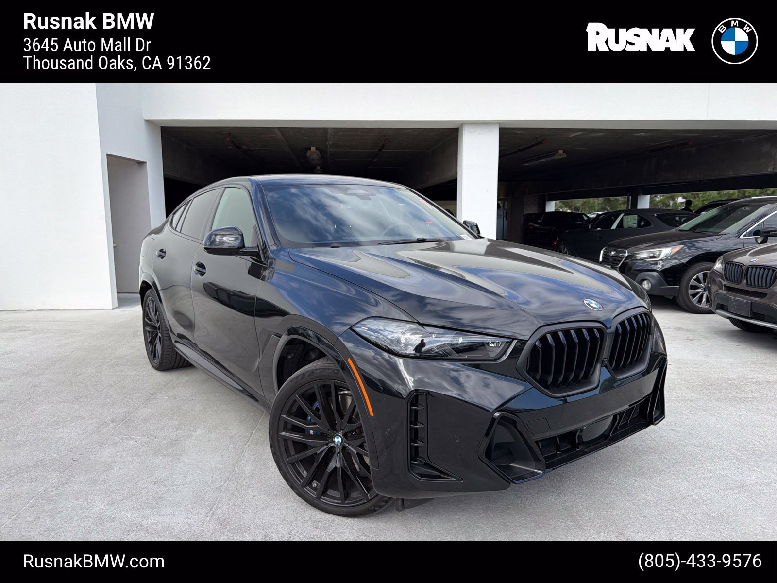 Certified Used 2024 Black Sapphire Metallic BMW xDrive40i image 1