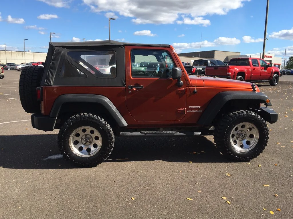 Used 2014 Orange Jeep Sport image 7