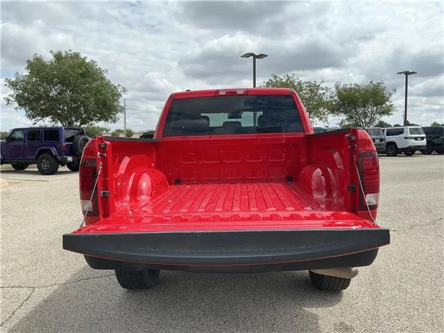 Used 2024 Flame Red Clearcoat RAM SLT 4x4 Crew Cab 5.6 ft. box 140 in. WB image 27