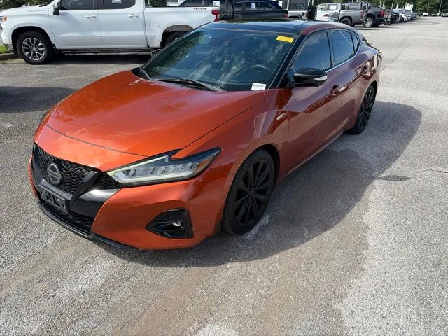 Used 2021 Orange Nissan SR image 1