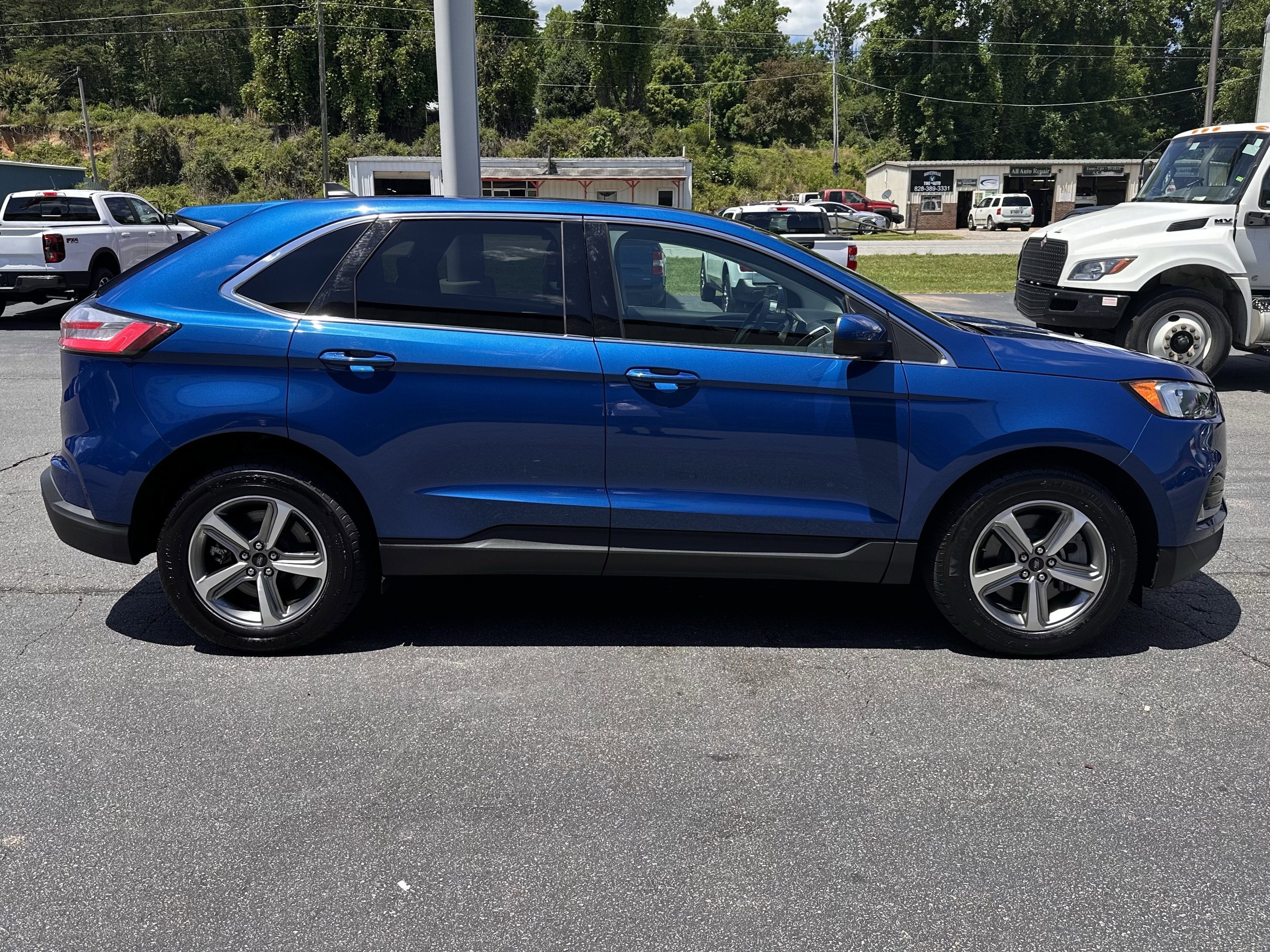 Certified Used 2024 Atlas Blue Metallic Ford SEL image 5