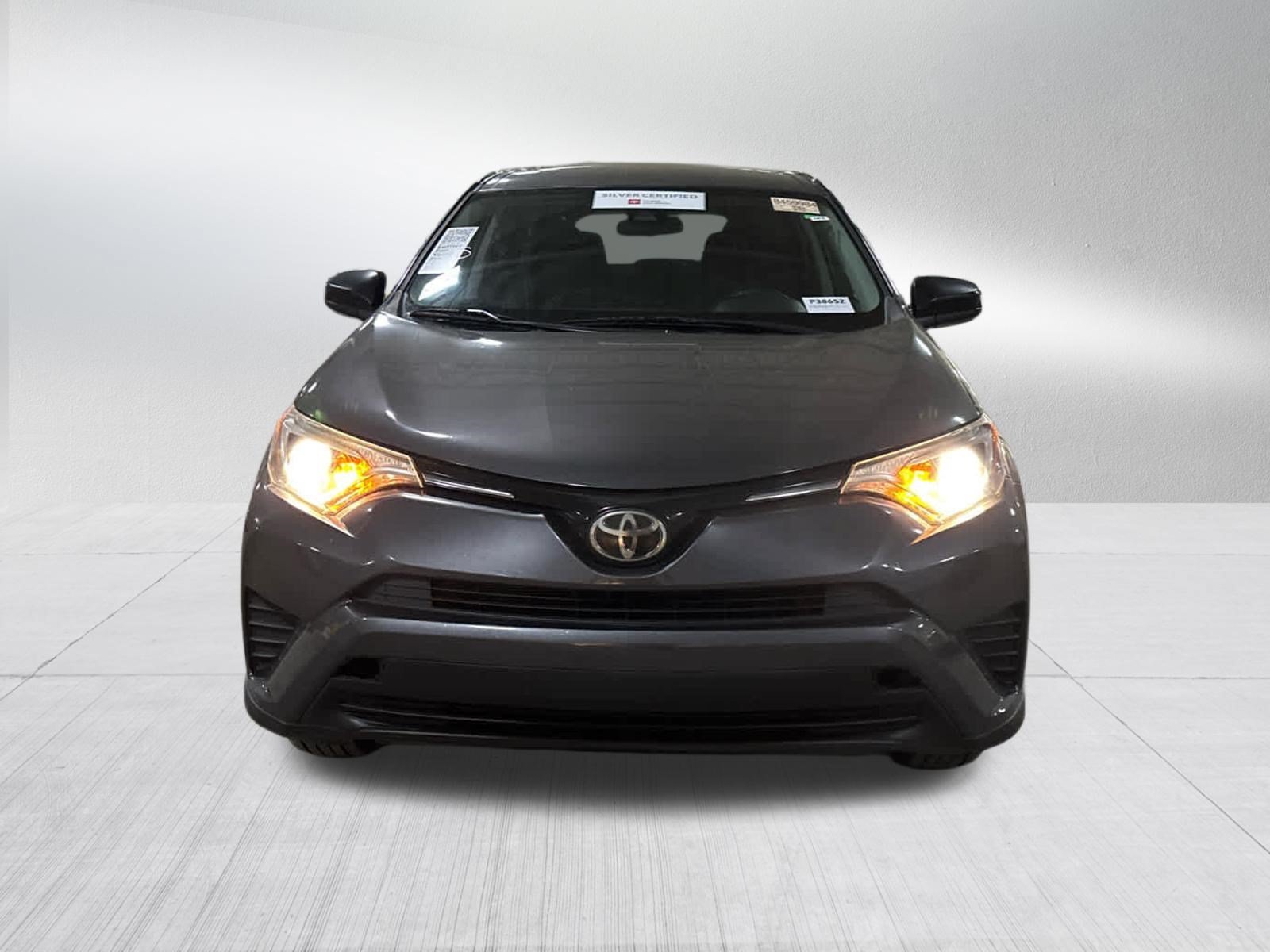 Used 2018 Magnetic Gray Metallic Toyota LE image 2