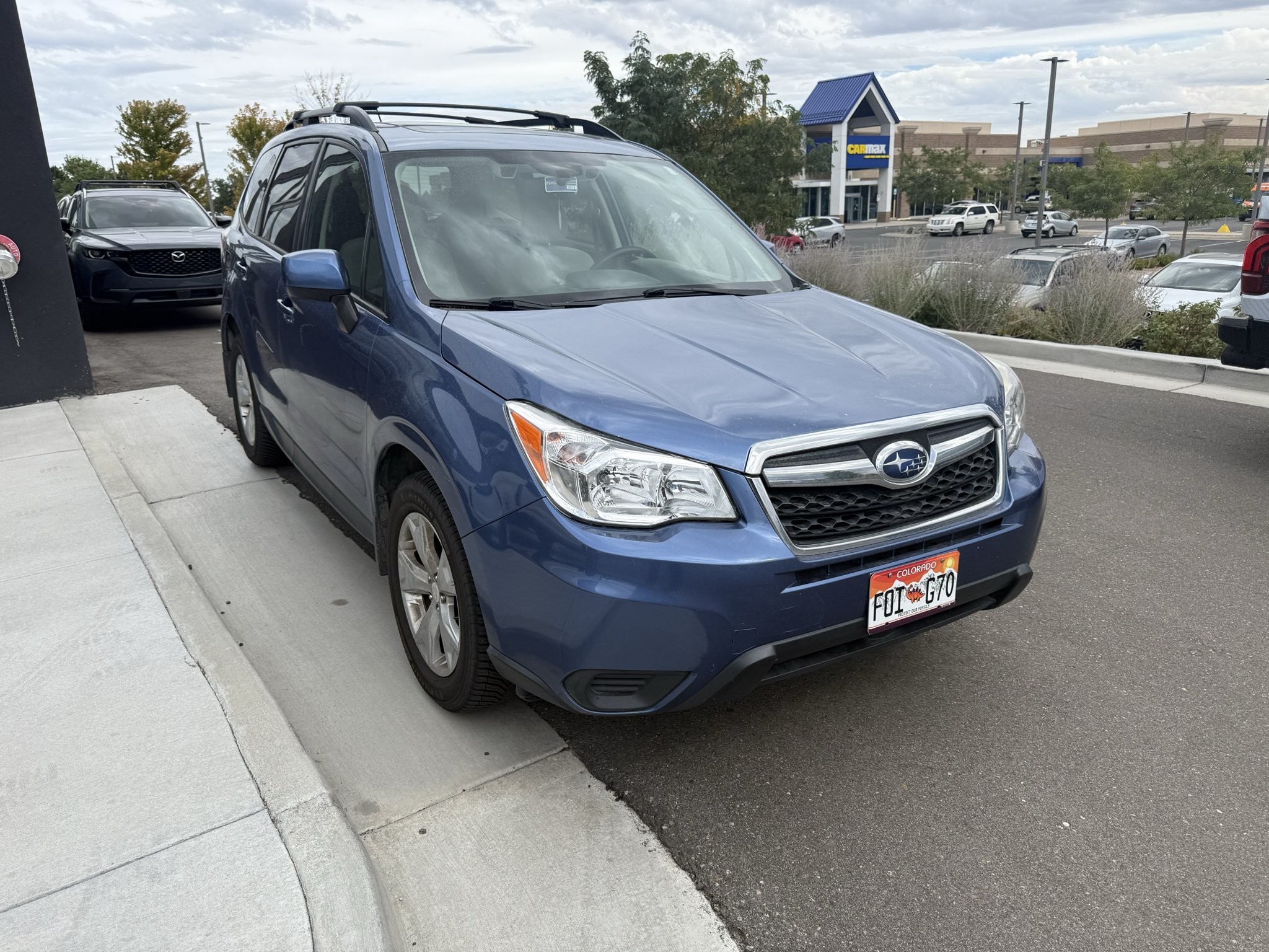 Used 2015 Quartz Blue Pearl Subaru 2.5i Premium image 1