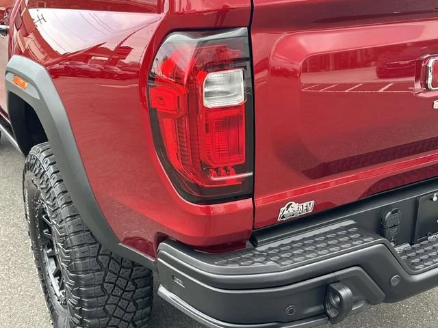 Used 2025 Volcanic Red Tintcoat GMC AT4 image 9