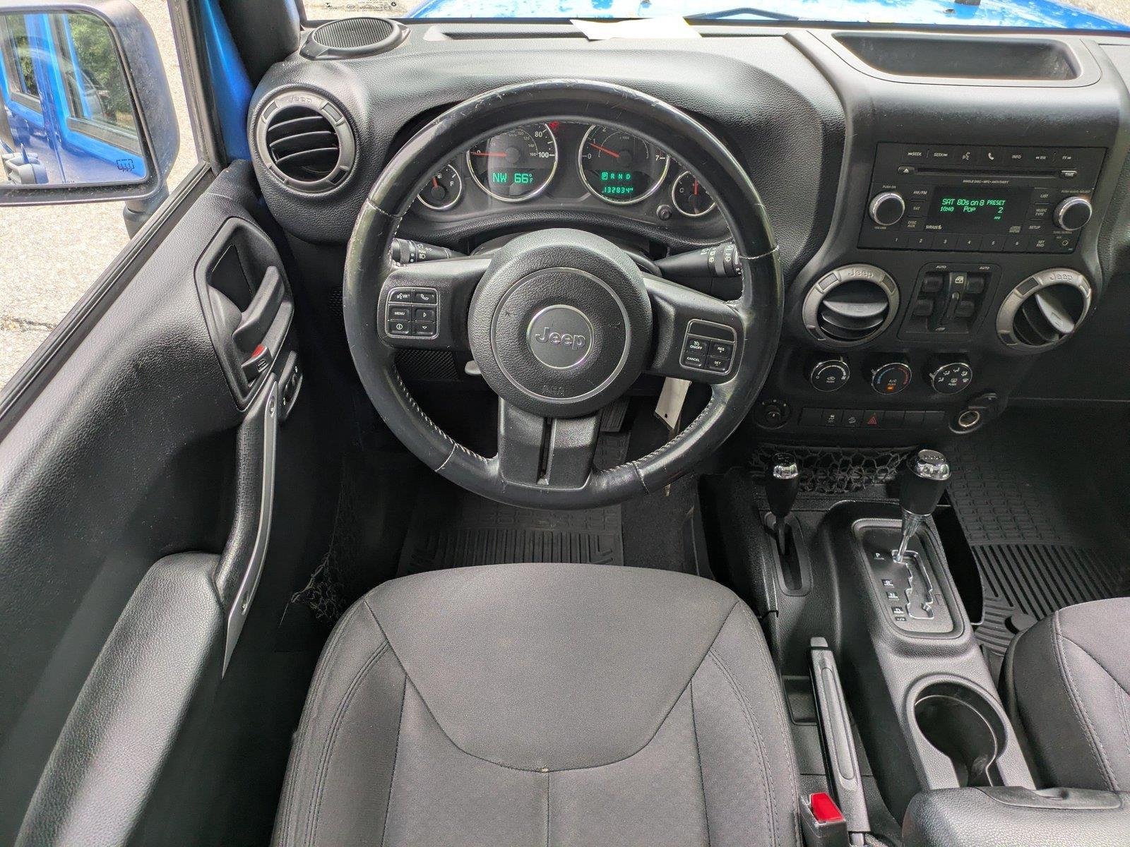 Used 2015 Hydro Blue Pearl Coat Jeep Sport image 16