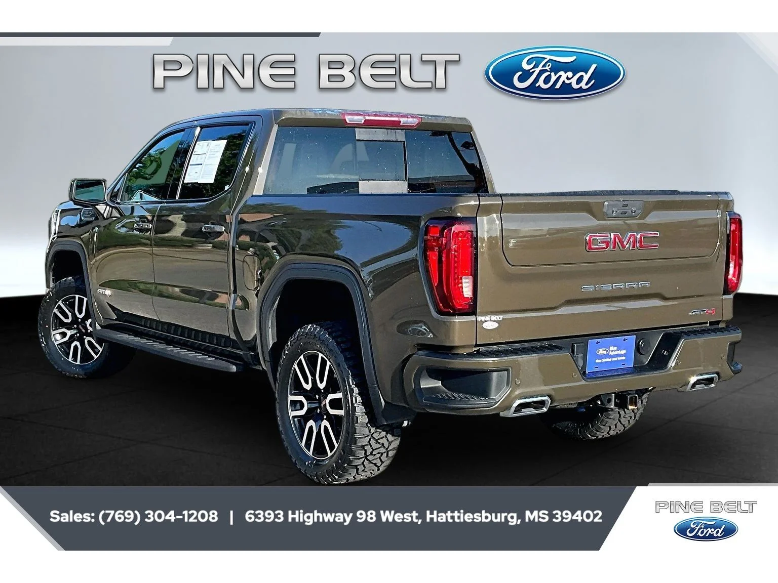 Used 2023 Deep Bronze Metallic GMC AT4 image 2
