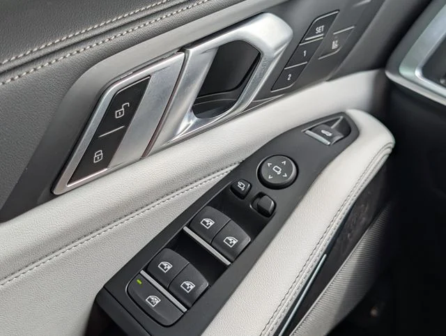 Used 2025 Black Sapphire Metallic BMW xDrive50e image 19