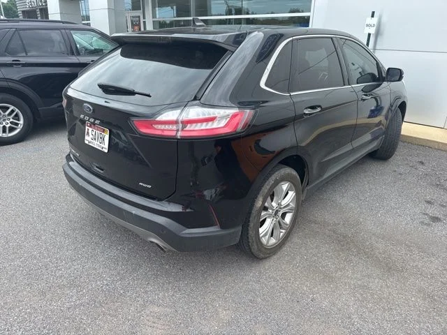 Used 2022 Black Ford Titanium image 4