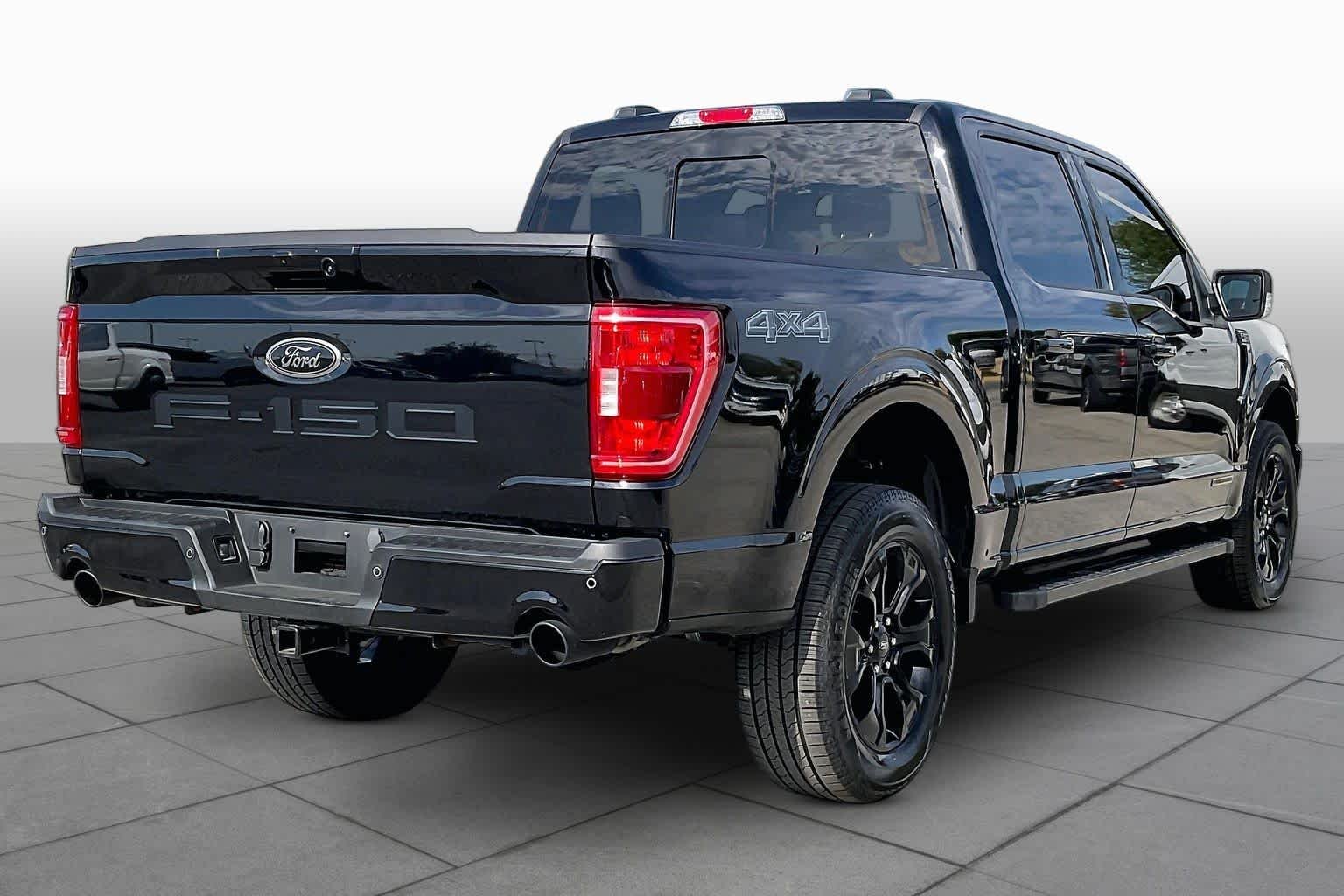 Used 2023 Agate Black Metallic Ford XLT image 13