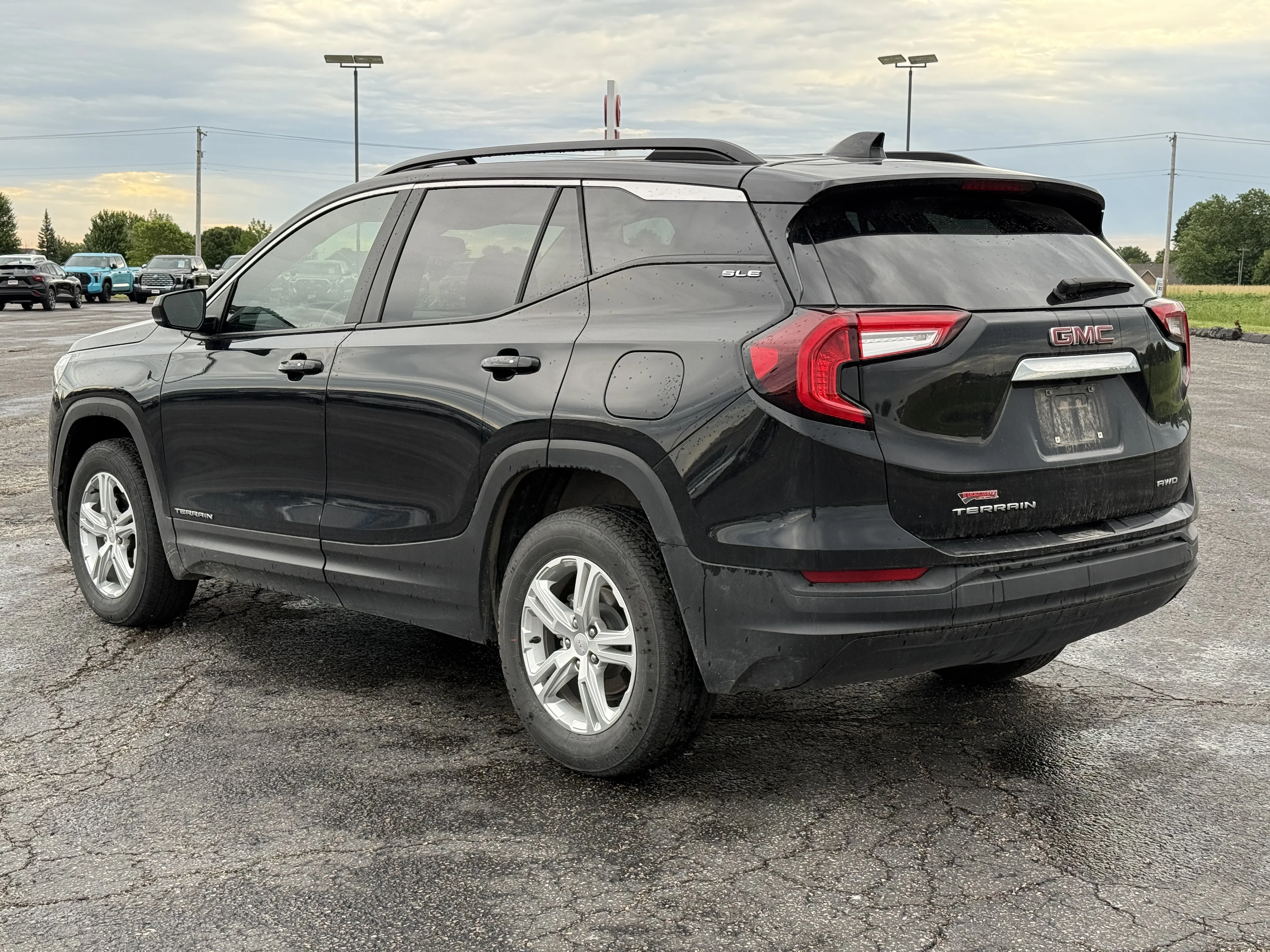 Used 2024 Ebony Twilight Metallic GMC SLE image 6