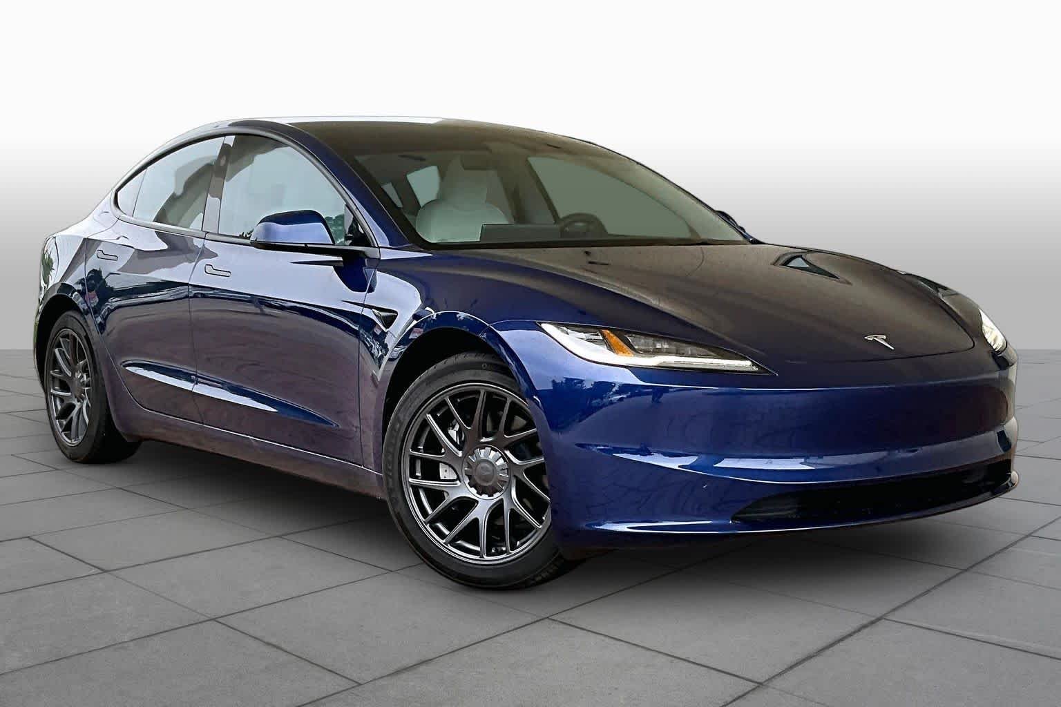 Used 2025 Solid Black Tesla Long Range image 2