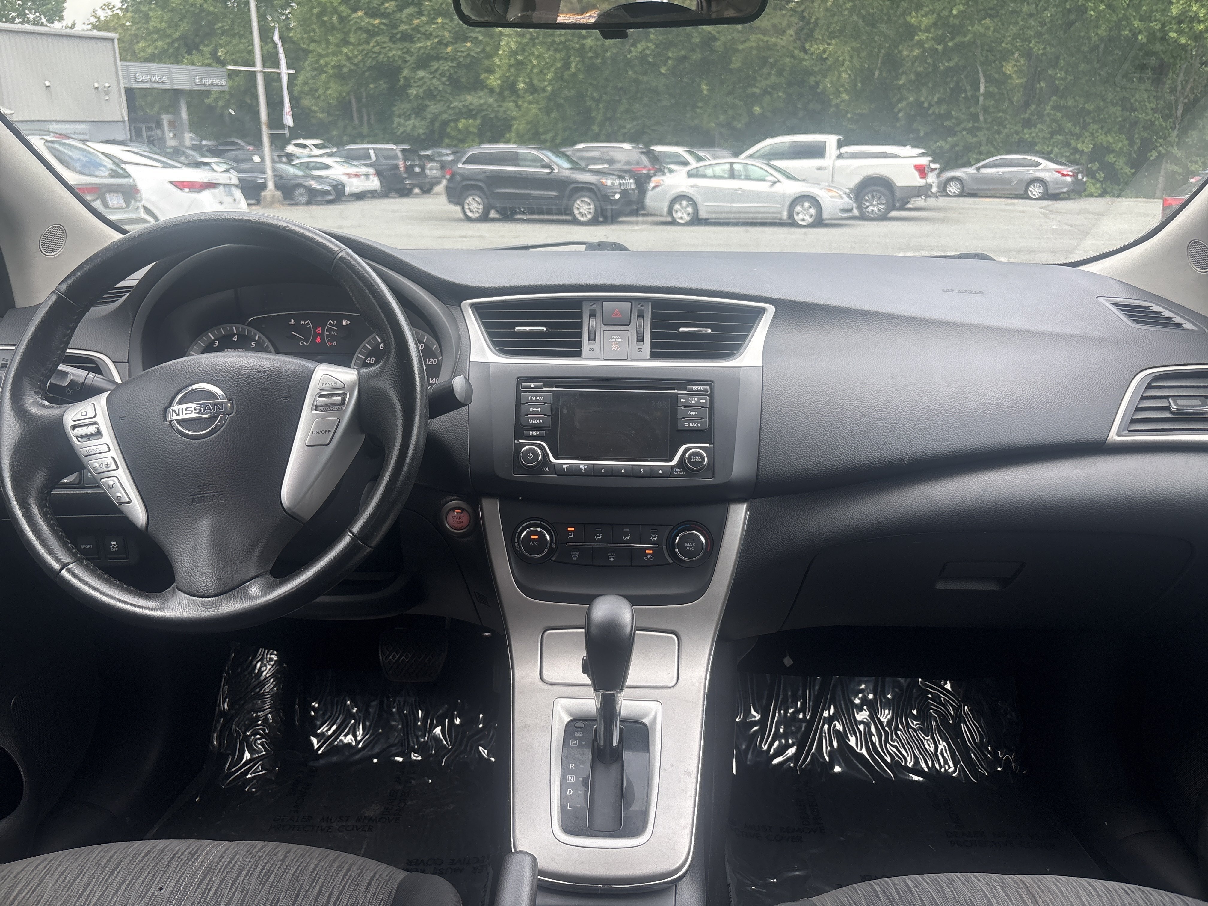 Used 2015 Super Black Nissan SV image 20