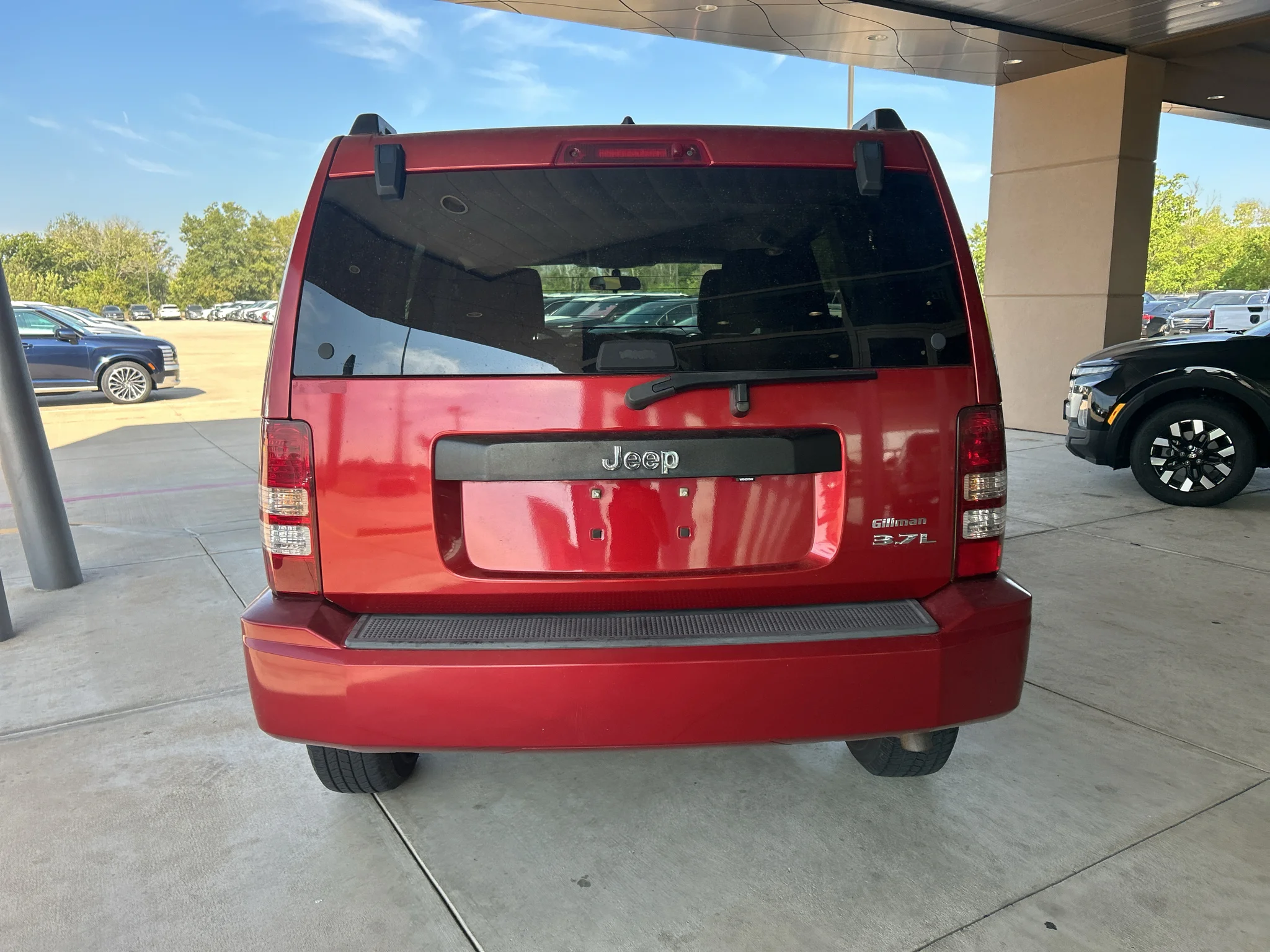 Used 2008 Inferno Red Crystal Pearlcoat Jeep Sport image 5