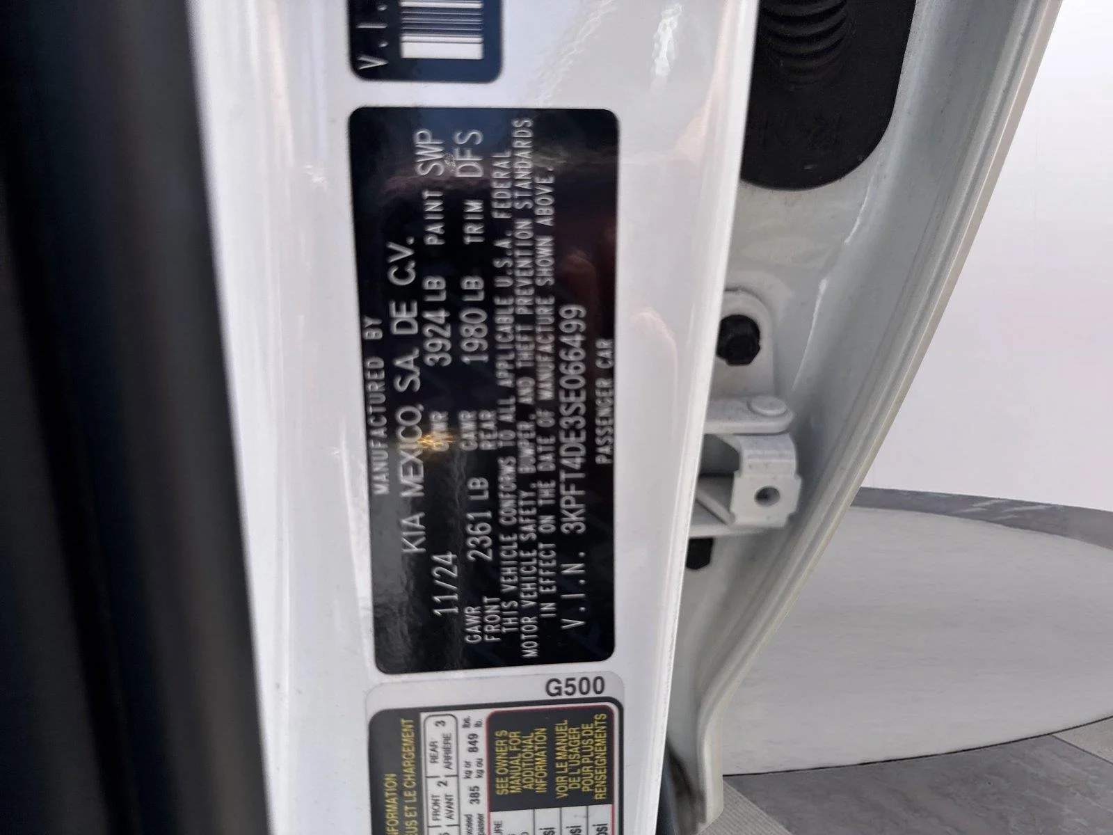 Used 2025 Snow White Pearl Kia LXS image 37