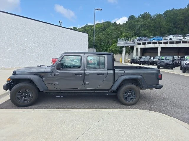 Used 2023 Granite Crystal Clearcoat Metallic Jeep Sport image 6