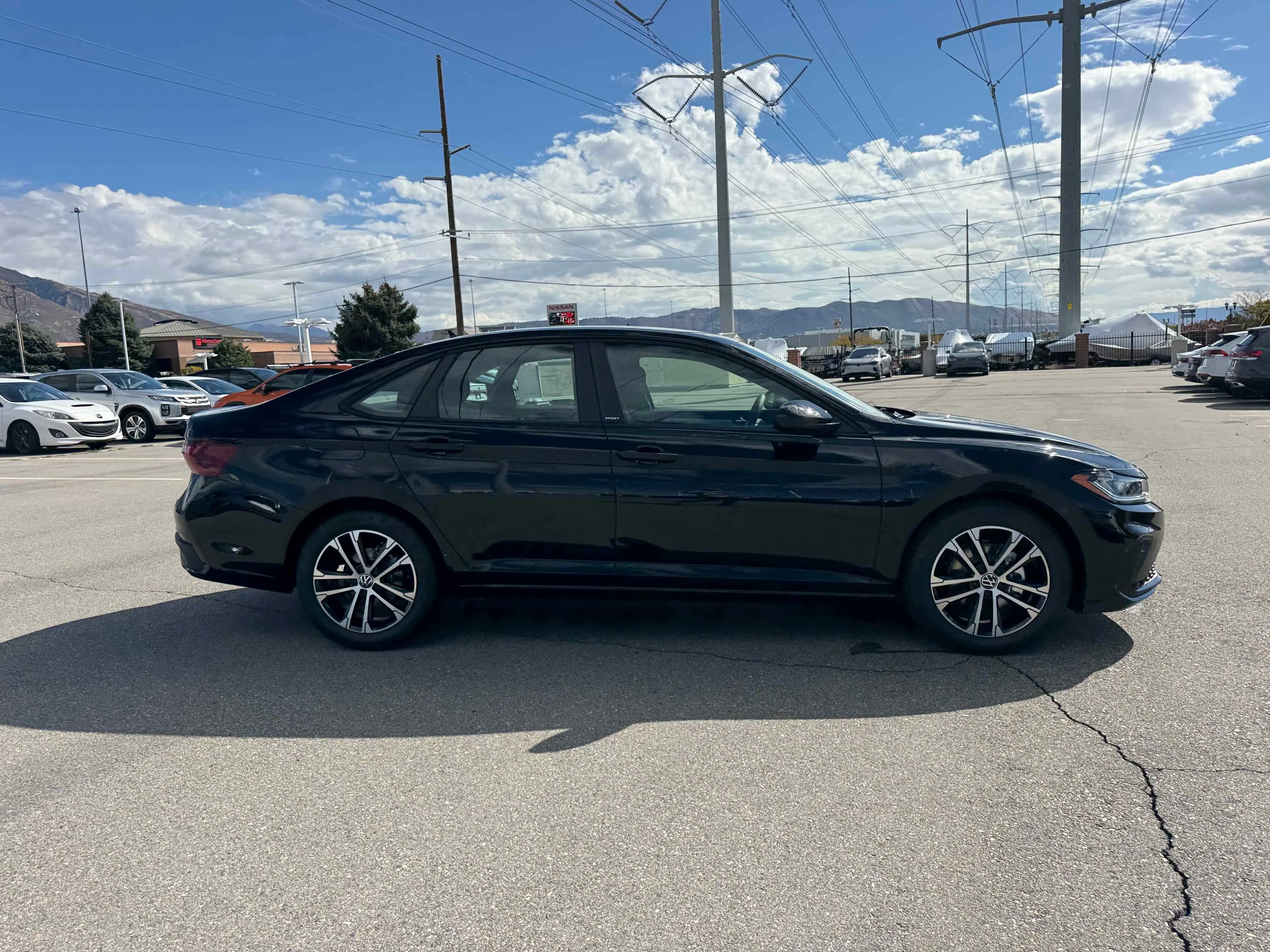 New 2026 Deep Black Volkswagen Sport image 8