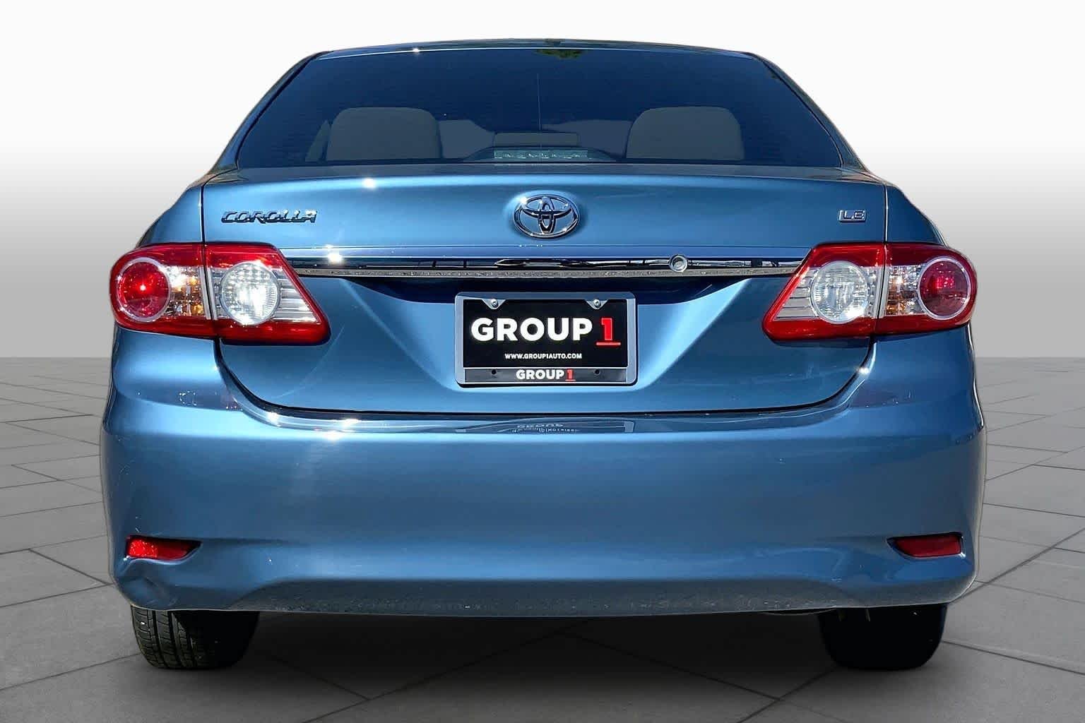 Used 2013 Tropical Sea Metallic Toyota LE image 5