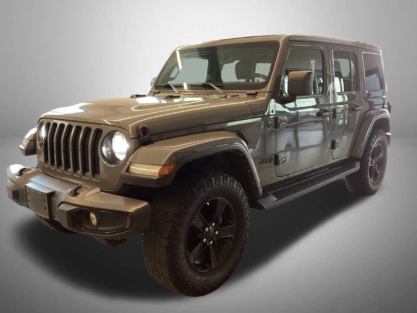 Used 2021 Gray Jeep Unlimited Sahara Altitude image 1