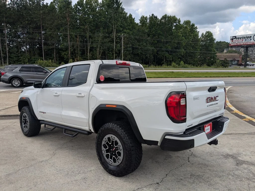 Used 2023 Summit White GMC 4WD AT4X image 7