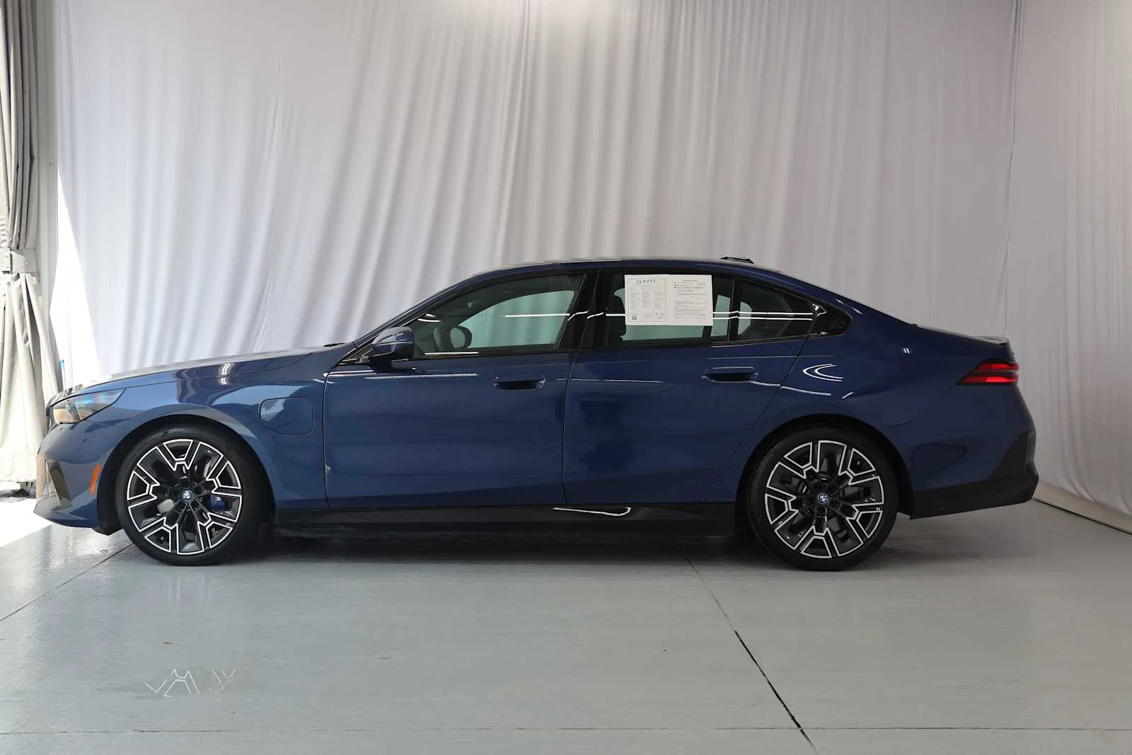 Certified Used 2025 Phytonic Blue Metallic BMW 550e xDrive image 7