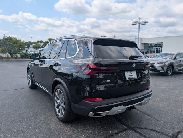 Certified Used 2024 Black Sapphire Metallic BMW xDrive40i image 2