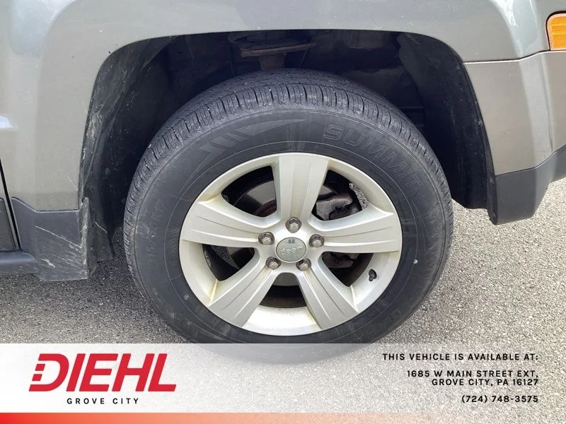 Used 2014 Gray Jeep Sport image 9