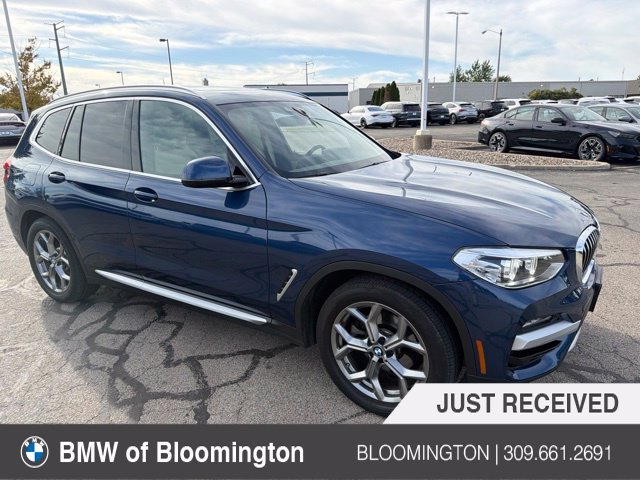 Used 2021 Blue Metallic BMW xDrive30e image 1