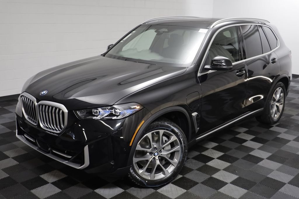 New 2026 Black Sapphire Metallic BMW xDrive50e image 2