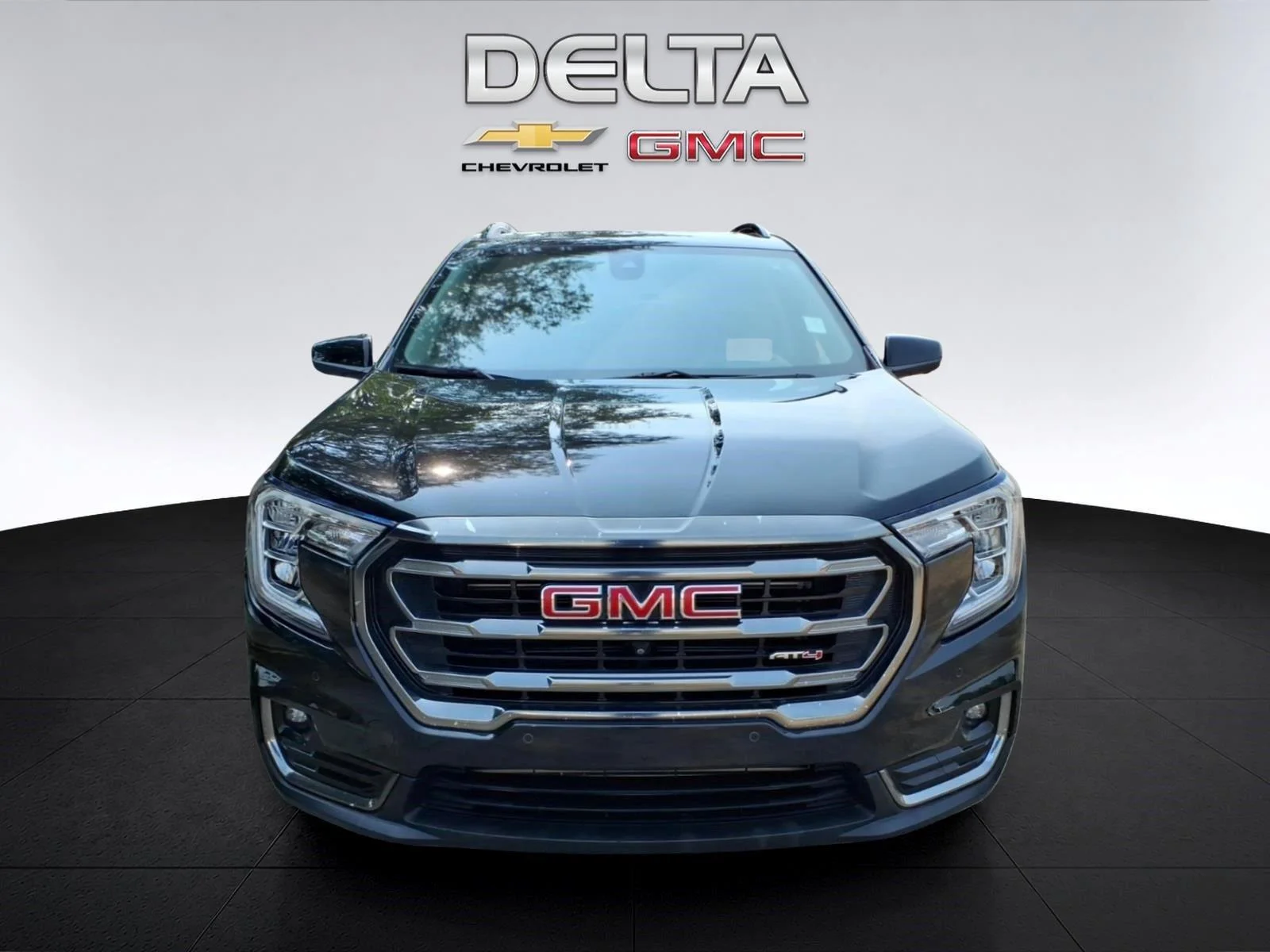 Used 2024 Ebony Twilight Metallic GMC AT4 image 8