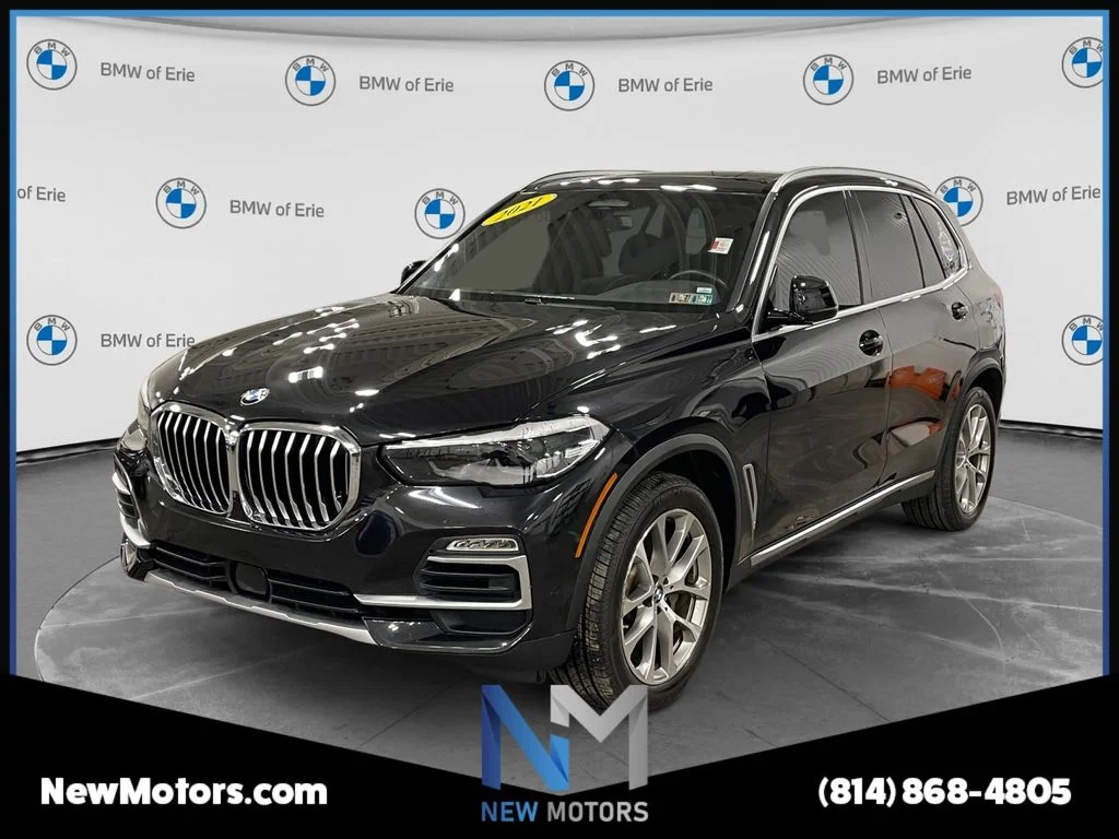 Used 2021 Black Sapphire Metallic BMW xDrive40i image 1