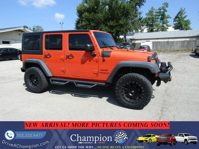 Used 2015 Orange Jeep Unlimited Sport image 4