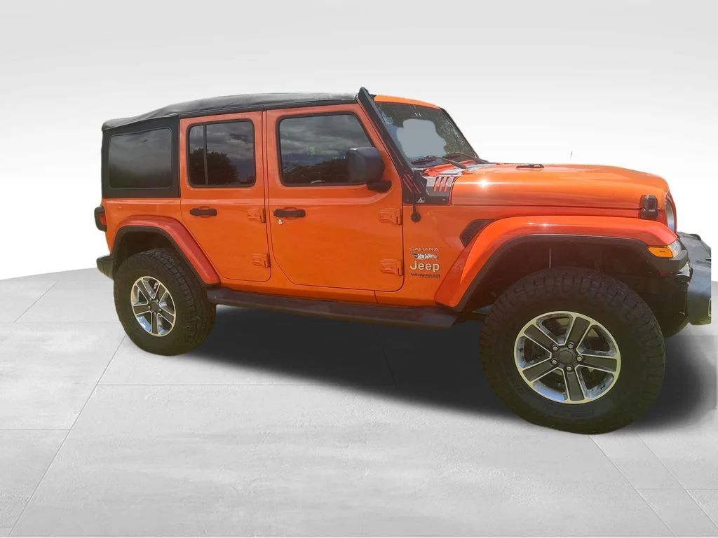 Used 2018 Orange Jeep Unlimited Sahara image 28