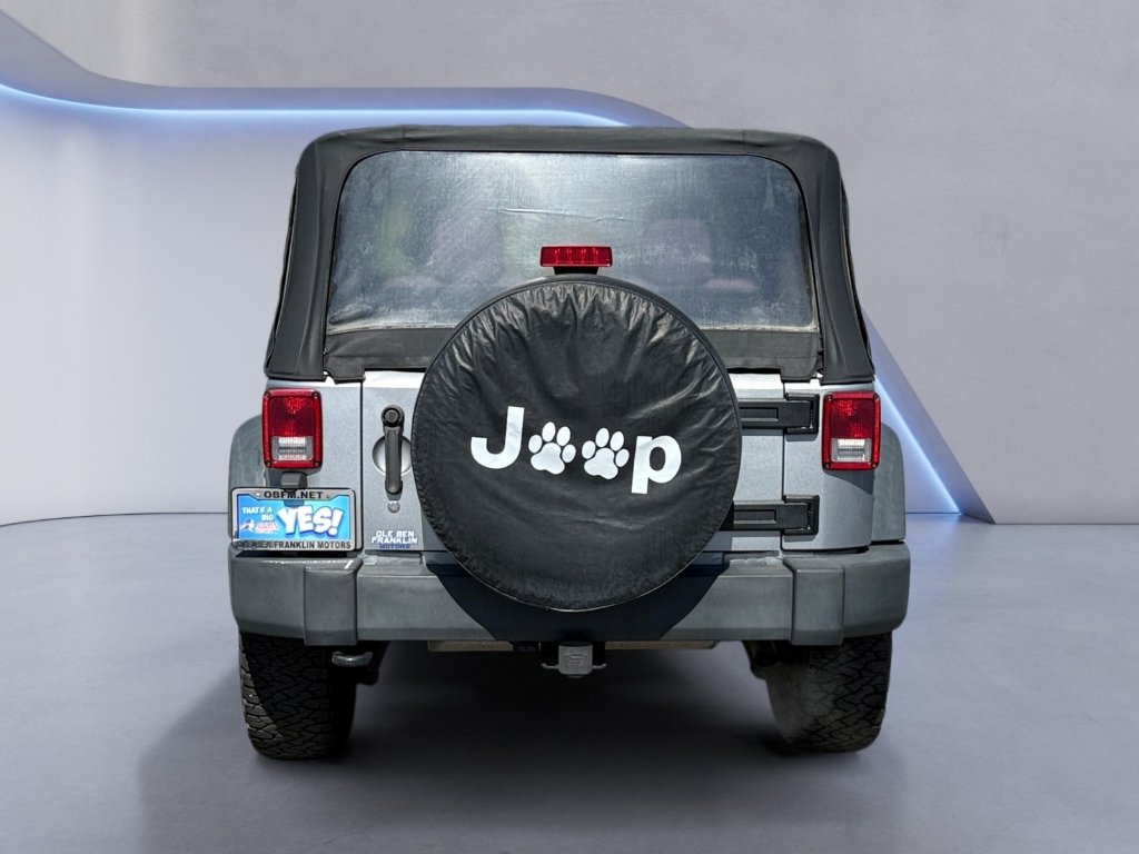 Used 2014 Billet Metallic Clearcoat Jeep Sport image 4
