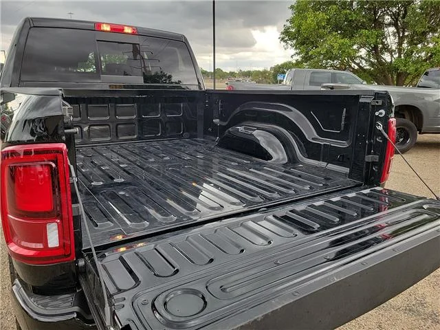 Used 2026 Diamond Black Crystal Pearlcoat RAM Laramie 4x4 Crew Cab 6.3 ft. box 149 in. WB image 8