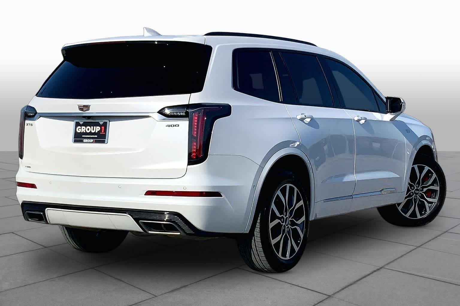 Used 2025 Crystal White Tricoat Cadillac AWD Sport image 13