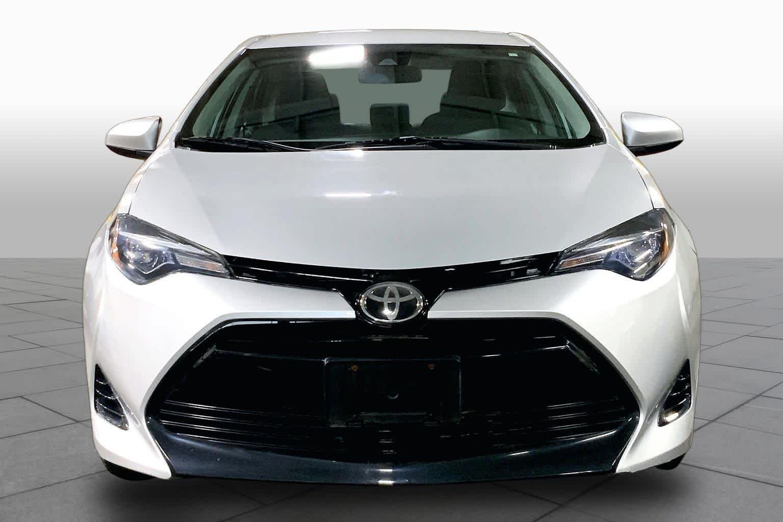 Used 2017 Classic Silver Metallic Toyota LE image 4