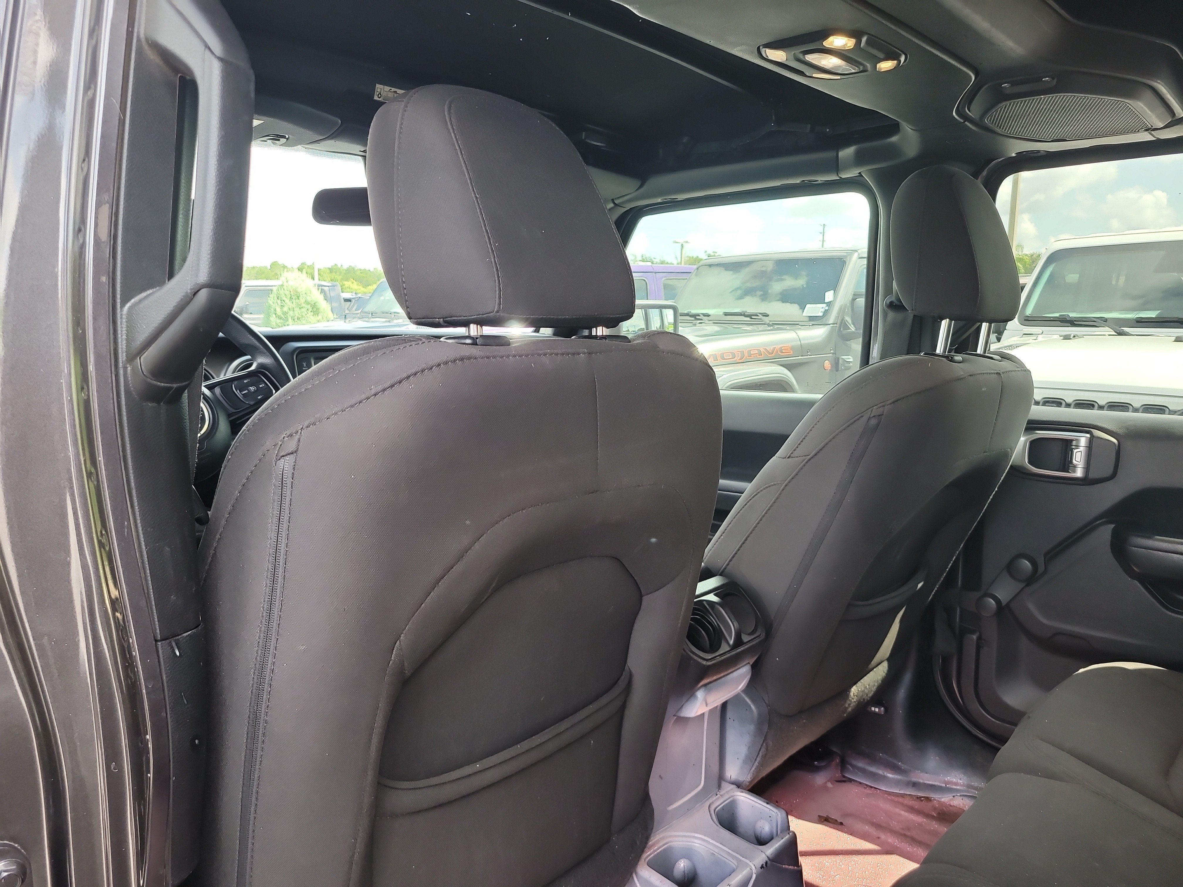 Used 2019 Granite Crystal Metallic Clearcoat Jeep Sport image 12