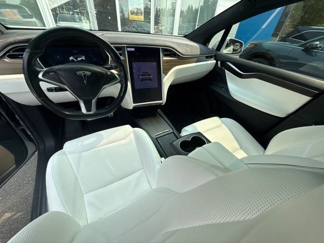 Used 2016 Solid White Tesla  image 6