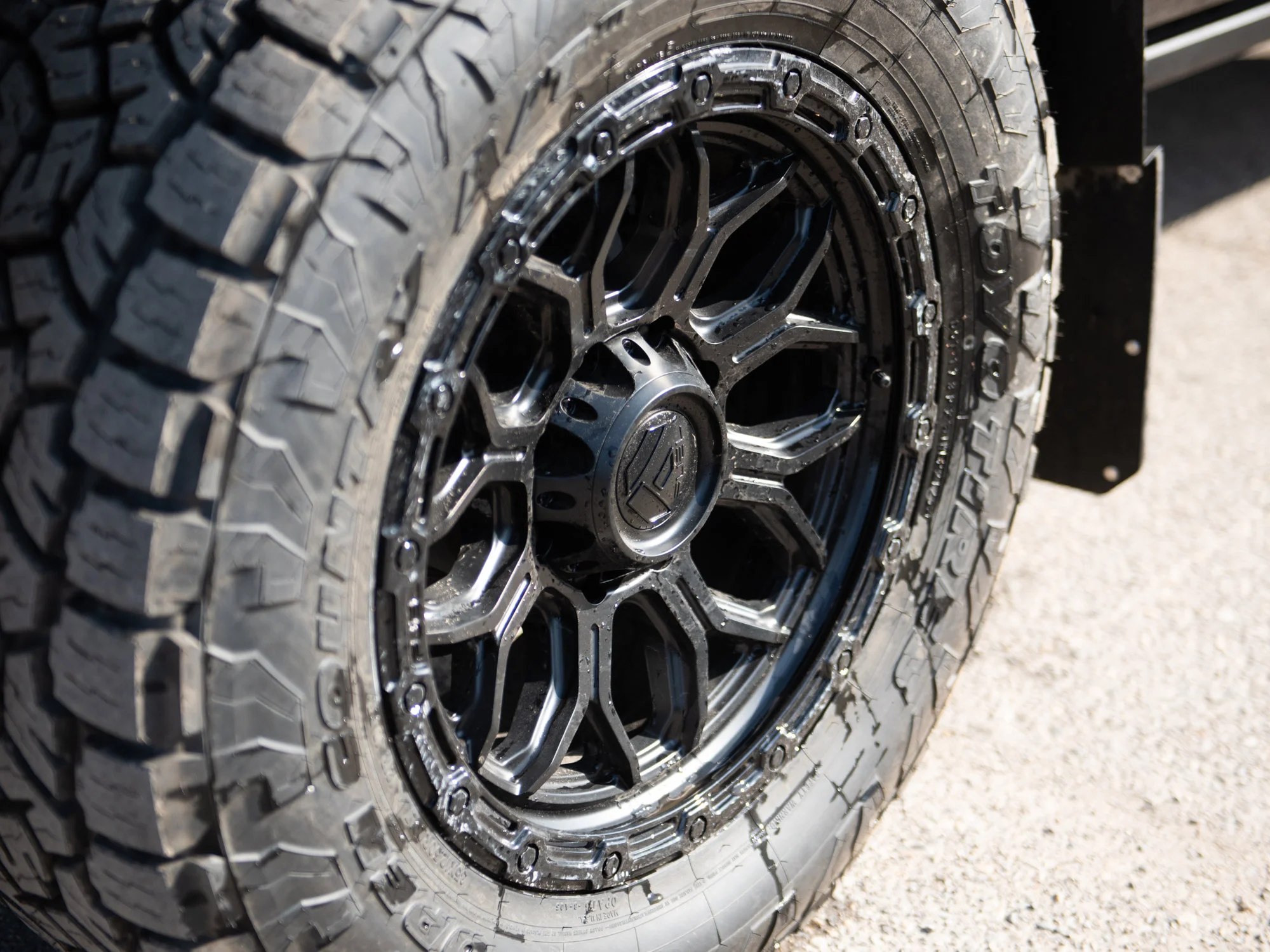 New 2026 Black RAM Laramie* Mega Cab, 2 Inch Lift, 35 Inch Tires, Trigger Industries Mudflaps image 3